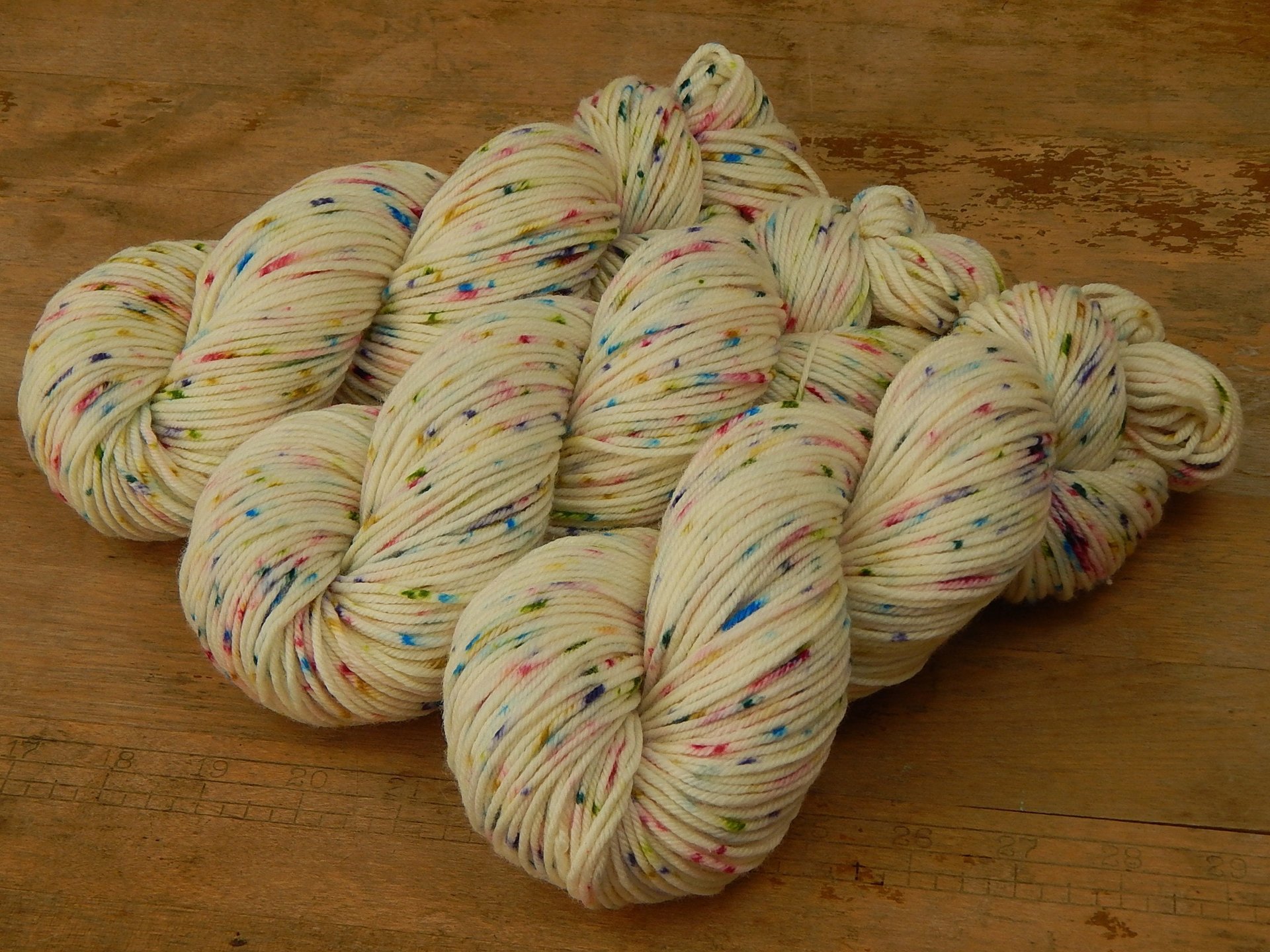 Hand Dyed Yarn, DK Weight Superwash Merino Wool - Potluck Confetti - Cream Off White Rainbow Speckled Indie Dyed Knitting Yarn